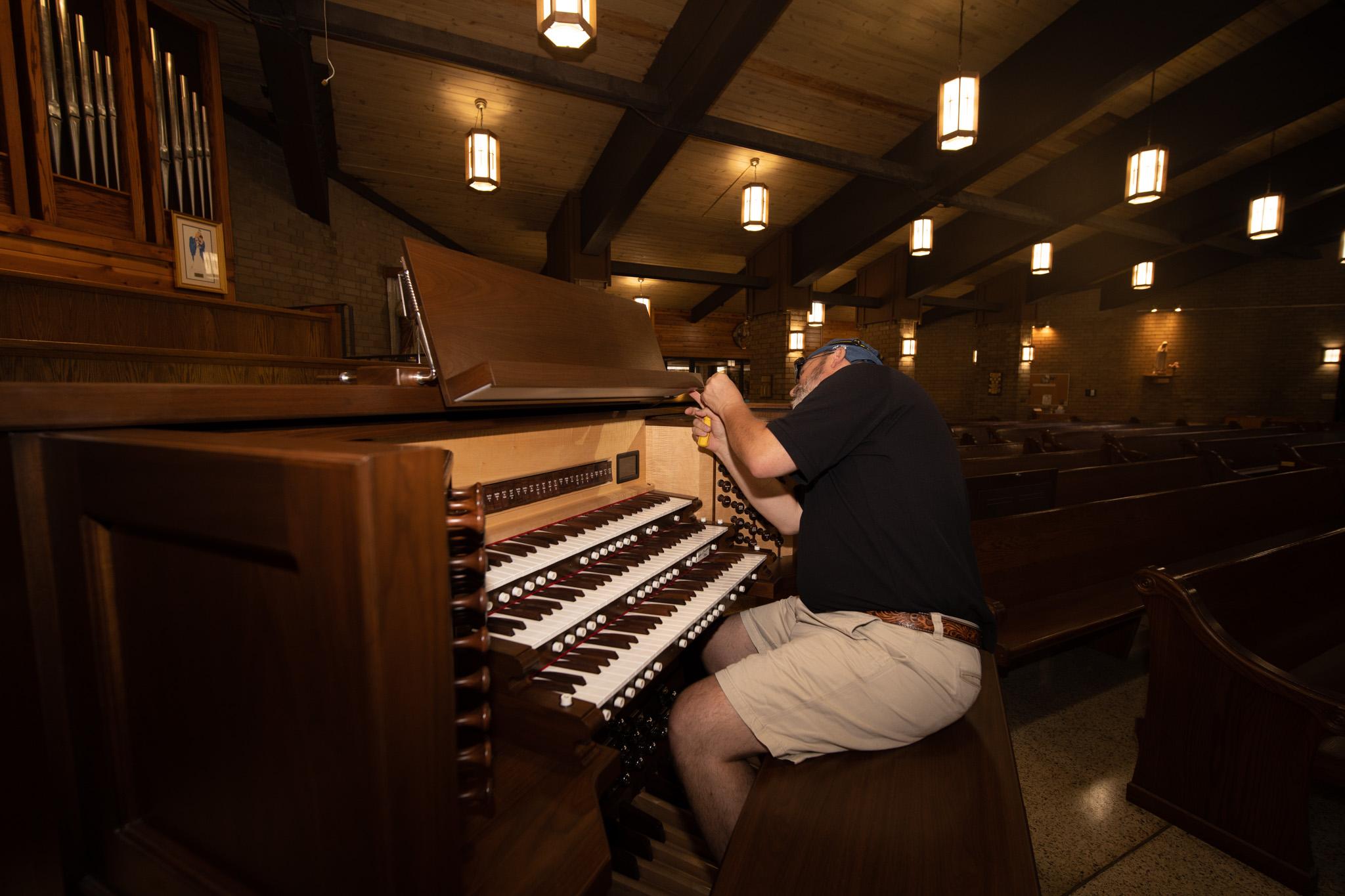 George from Fox installing the additional parts of the organ