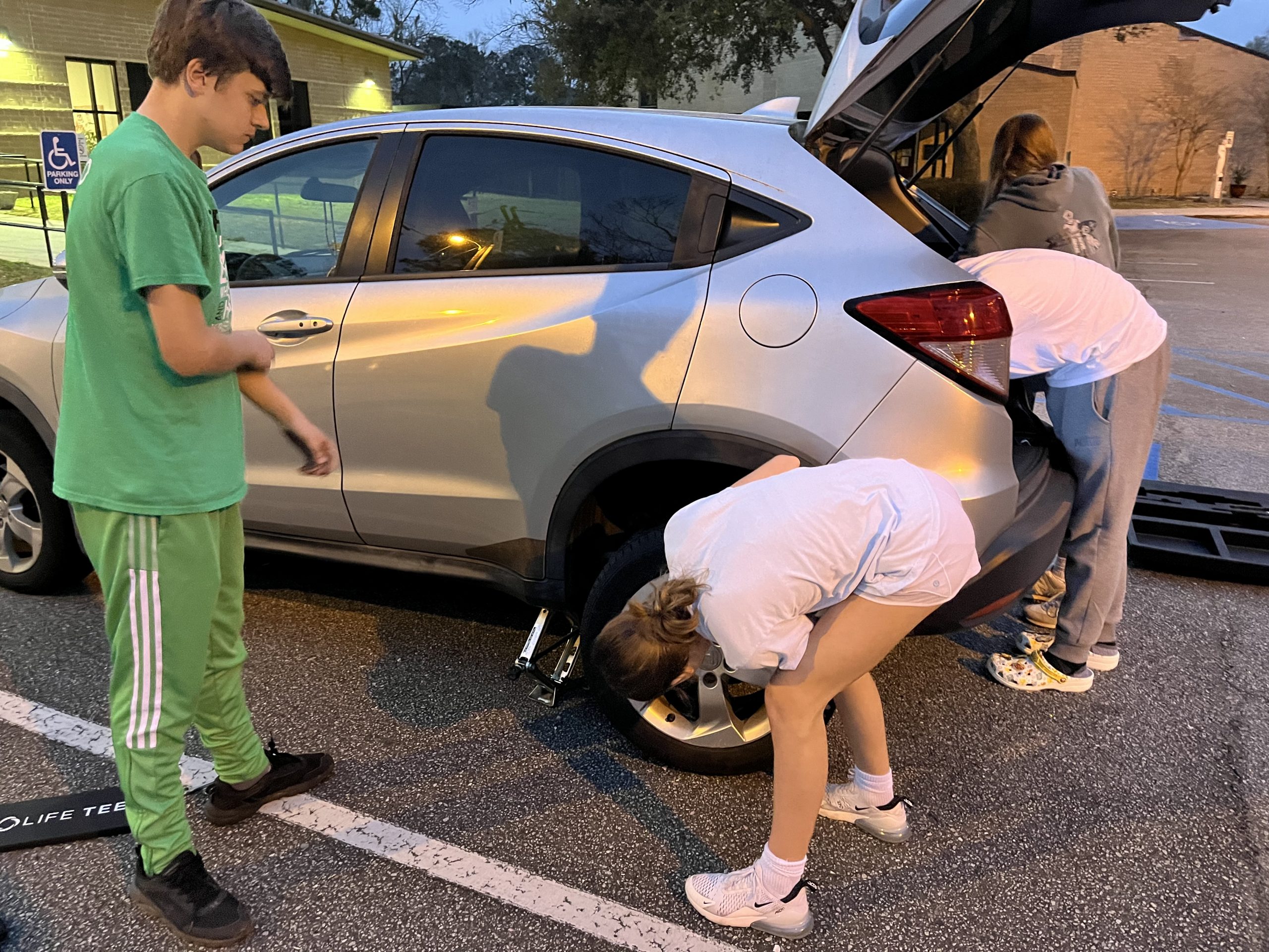 High School Changing a Tire